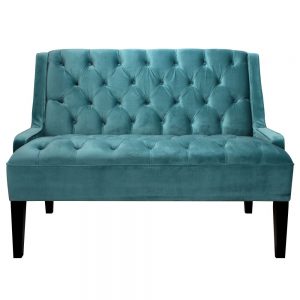 sofa de terciopelo azul con capitone